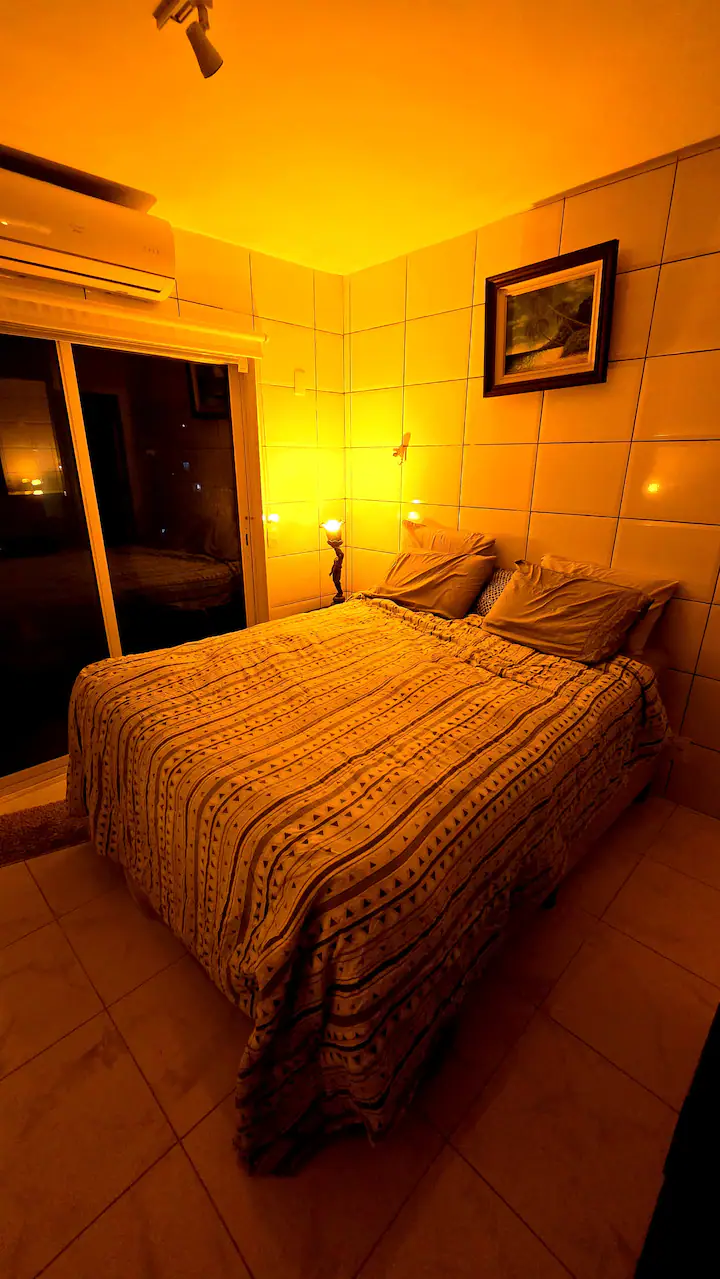 Bedroom at night with ambient lighting