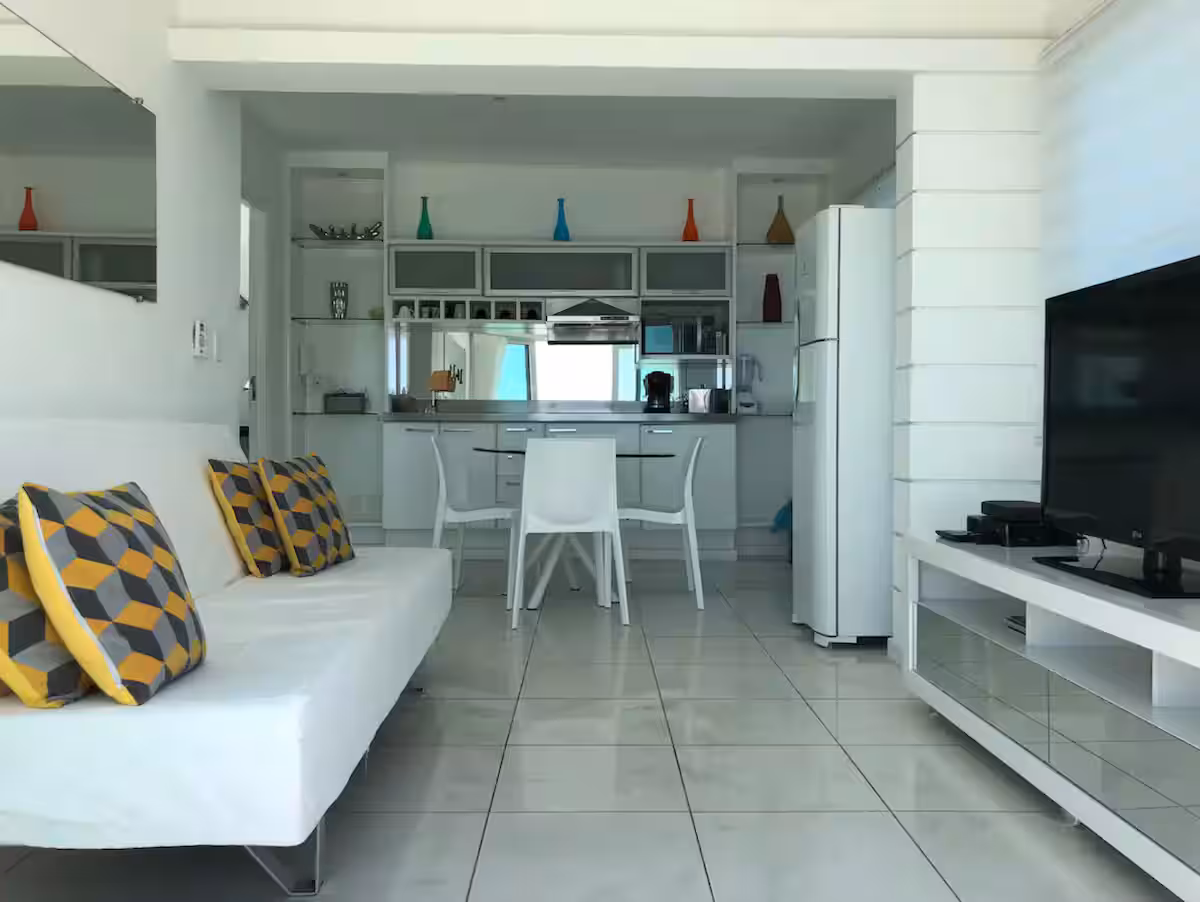 Main living room with ocean-facing balcony