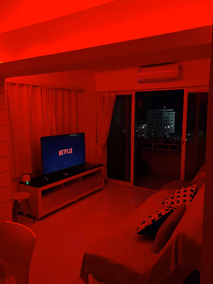 Living room with ambient red lighting